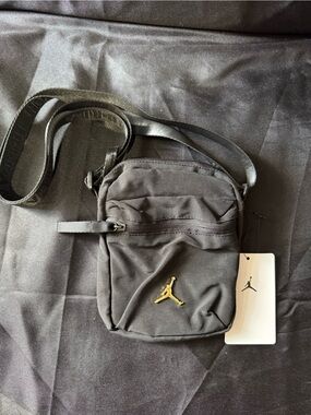 New Jordan Black Shoulder Pouch with Gold Jumpman Accent